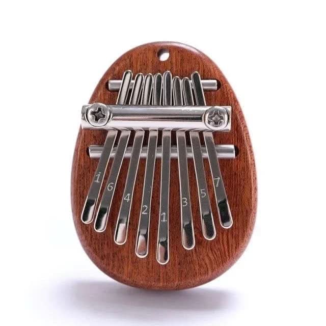 50% OFF | HarmoPalm™ - Mini Kalimba Finger Piano