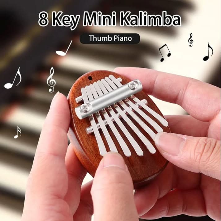 50% OFF | HarmoPalm™ - Mini Kalimba Finger Piano