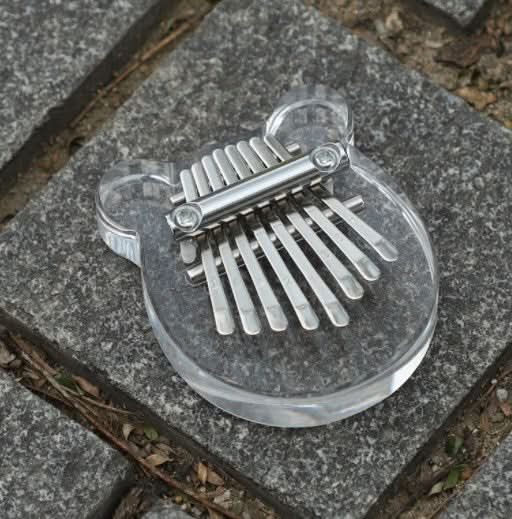 50% OFF | HarmoPalm™ - Mini Kalimba Finger Piano