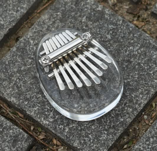 50% OFF | HarmoPalm™ - Mini Kalimba Finger Piano