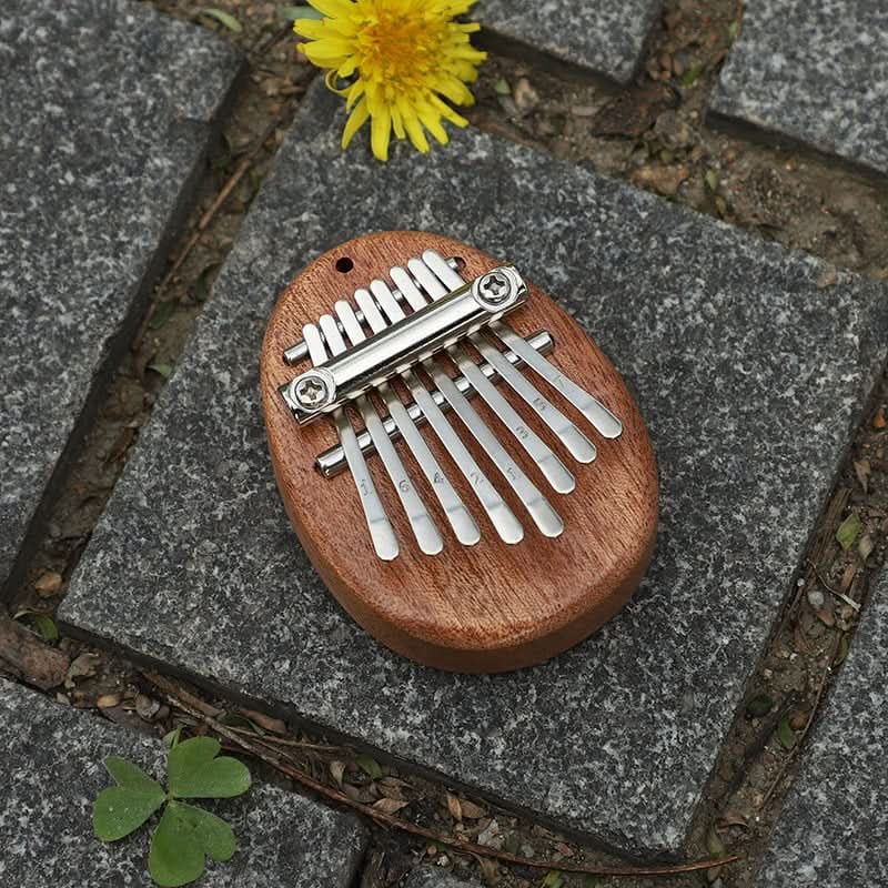 50% OFF | HarmoPalm™ - Mini Kalimba Finger Piano