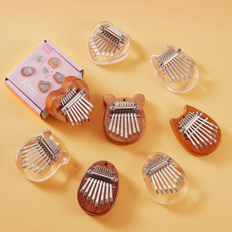 50% OFF | HarmoPalm™ - Mini Kalimba Finger Piano