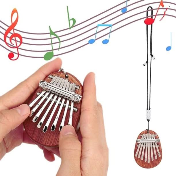 50% OFF | HarmoPalm™ - Mini Kalimba Finger Piano