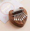50% OFF | HarmoPalm™ - Mini Kalimba Finger Piano